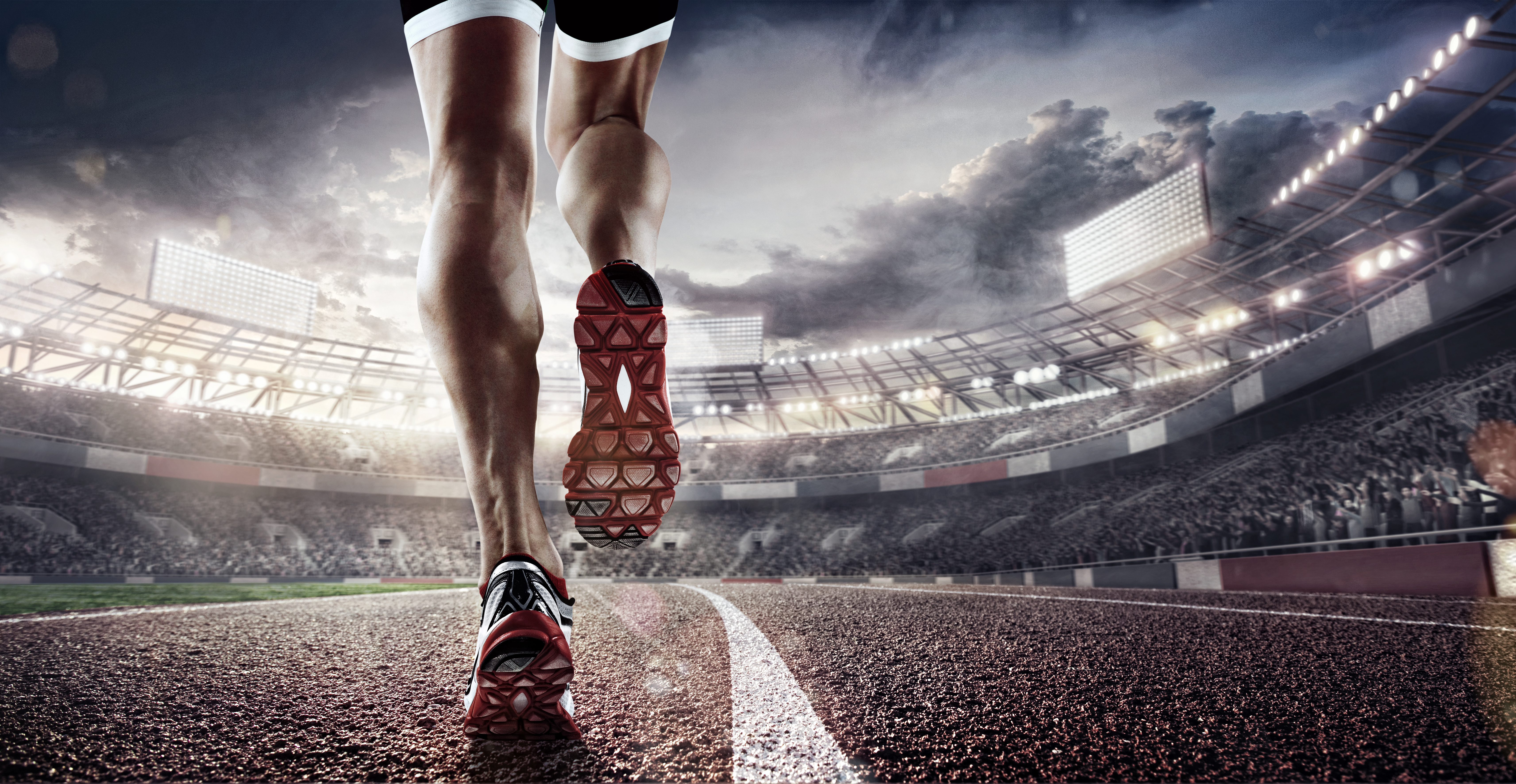 Sports background. Runner feet running on stadium closeup on shoe ...